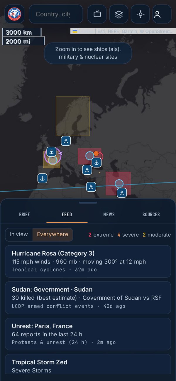 The Live Map on a phone showing worldwide events and a feed led by a Category 3 hurricane